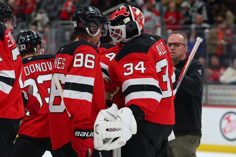 Mar 29, 2026; Newark, New Jersey, USA; New Jersey Devils center Jack Hughes (86) and New Jersey Devils goaltender Jake Allen (34) celebrate the Devils win over the Chicago Blackhawks at Prudential Center. Mandatory Credit: Ed Mulholland-Imagn Images Mar 29, 2026; Newark, New Jersey, USA; New Jersey Devils center Jack Hughes (86) and New Jersey Devils goaltender Jake Allen (34) celebrate the Devils win over the Chicago Blackhawks at Prudential Center. Mandatory Credit: Ed Mulholland-Imagn Images