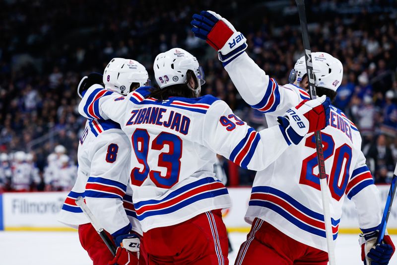 Mar 11, 2025; Winnipeg, Manitoba, CAN;  New York Rangers forward Mika Zibanejad (93) is congratulated by his team mates on his goal against Winnipeg Jets goalie Connor Hellebuyck (37) during the first period at Canada Life Centre. Mandatory Credit: Terrence Lee-Imagn Images