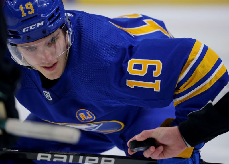 Jan 9, 2024; Buffalo, New York, USA;  Buffalo Sabres center Peyton Krebs (19) waits for the face-off during the second period against the Seattle Kraken at KeyBank Center. Mandatory Credit: Timothy T. Ludwig-USA TODAY Sports