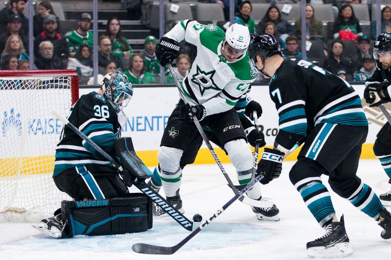 Mar 5, 2024; San Jose, California, USA; San Jose Sharks goaltender Kaapo Kahkonen (36) defends against a shot by Dallas Stars left wing Mason Marchment (27) during the first period at SAP Center at San Jose. Mandatory Credit: John Hefti-USA TODAY Sports