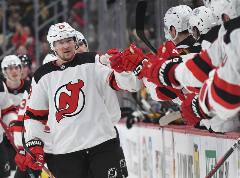 Nov 16, 2023; Pittsburgh, Pennsylvania, USA; New Jersey Devils center Tyler Toffoli (73) celebrates a goal  against the Pittsburgh Penguins during the third period at PPG Paints Arena. Mandatory Credit: Philip G. Pavely-USA TODAY Sports