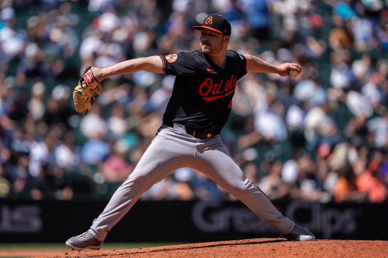 Jun 5, 2025; Seattle, Washington, USA;  Reliever Keegan Akin (45) delivers a pitchduring the seventh inning against the Seattle Mariners at T-Mobile Park. Mandatory Credit: Stephen Brashear-Imagn Images