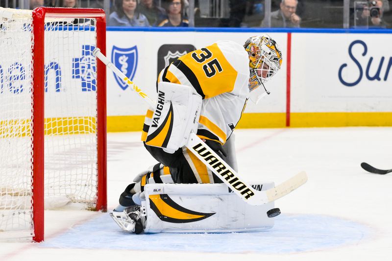Apr 3, 2025; St. Louis, Missouri, USA;  Pittsburgh Penguins goaltender Tristan Jarry (35) defends the net against the St. Louis Blues during the second period at Enterprise Center. Mandatory Credit: Jeff Curry-Imagn Images