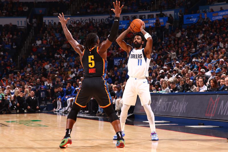 OKLAHOMA CITY, OK - NOVEMBER 17: Kyrie Irving #11 of the Dallas Mavericks handles the ball during the game against the Oklahoma City Thunder on November 17, 2024 at Paycom Center in Oklahoma City, Oklahoma. NOTE TO USER: User expressly acknowledges and agrees that, by downloading and or using this photograph, User is consenting to the terms and conditions of the Getty Images License Agreement. Mandatory Copyright Notice: Copyright 2024 NBAE (Photo by Zach Beeker/NBAE via Getty Images)