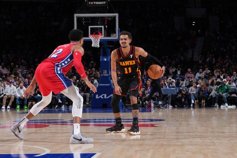 PHILADELPHIA, PA - FEBRUARY 9: Trae Young #11 of the Atlanta Hawks dribbles the ball during the game against the Philadelphia 76ers on February 9, 2024 at the Wells Fargo Center in Philadelphia, Pennsylvania NOTE TO USER: User expressly acknowledges and agrees that, by downloading and/or using this Photograph, user is consenting to the terms and conditions of the Getty Images License Agreement. Mandatory Copyright Notice: Copyright 2024 NBAE (Photo by Jesse D. Garrabrant/NBAE via Getty Images)