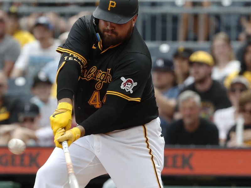 Jun 9, 2024; Pittsburgh, Pennsylvania, USA; Pittsburgh Pirates first baseman Rowdy Tellez (44) hits a single against the Minnesota Twins during the sixth inning at PNC Park. Mandatory Credit: Charles LeClaire-USA TODAY Sports