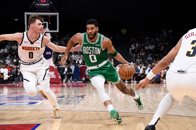 ABU DHABI, UAE - OCTOBER 6: Jayson Tatum #0 of the Boston Celtics dribbles the ball during the game against the Denver Nuggets during the 2024 Global Games on October 6, 2024 at the Etihad Arena in Abu Dhabi, United Arab Emirates. NOTE TO USER: User expressly acknowledges and agrees that, by downloading and/or using this Photograph, user is consenting to the terms and conditions of the Getty Images License Agreement. Mandatory Copyright Notice: Copyright 2024 NBAE (Photo by Brian Babineau/NBAE via Getty Images)