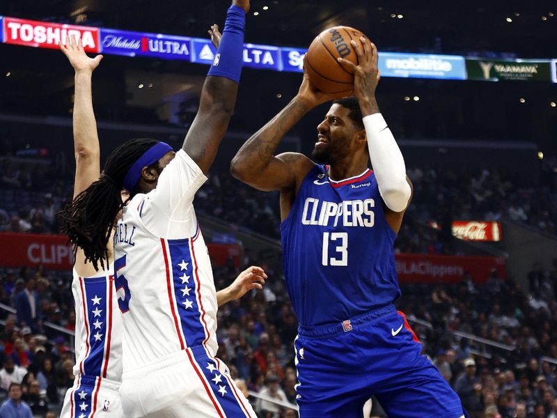 LOS ANGELES, CALIFORNIA - JANUARY 17:  Paul George #13 of the LA Clippers takes a shot against the Philadelphia 76ers in the first half at Crypto.com Arena on January 17, 2023 in Los Angeles, California.  NOTE TO USER: User expressly acknowledges and agrees that, by downloading and/or using this photograph, user is consenting to the terms and conditions of the Getty Images License Agreement.  (Photo by Ronald Martinez/Getty Images)