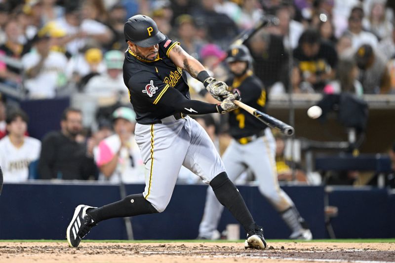 May 30, 2025; San Diego, California, USA; Pittsburgh Pirates left fielder Tommy Pham (28) hits a single during the sixth inning against the San Diego Padres at Petco Park. Mandatory Credit: Denis Poroy-Imagn Images