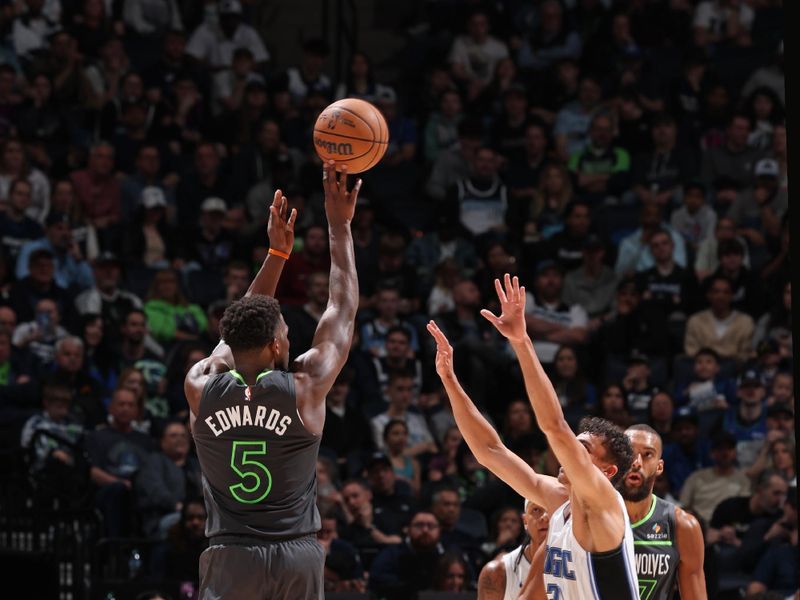 MINNEAPOLIS, MN -  MARCH 14:  Anthony Edwards #5 of the Minnesota Timberwolves shoots the ball during the game against the Orlando Magic  on March 14, 2025 at Target Center in Minneapolis, Minnesota. NOTE TO USER: User expressly acknowledges and agrees that, by downloading and or using this Photograph, user is consenting to the terms and conditions of the Getty Images License Agreement. Mandatory Copyright Notice: Copyright 2025 NBAE (Photo by David Sherman/NBAE via Getty Images)