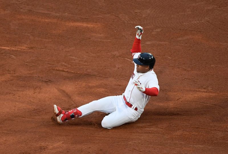 Sep 23, 2023; Boston, Massachusetts, USA; Boston Red Sox second baseman Enmanuel Valdez (47) slides into second base for a double during the fifth inning against the Chicago White Sox at Fenway Park. Mandatory Credit: Bob DeChiara-USA TODAY Sports