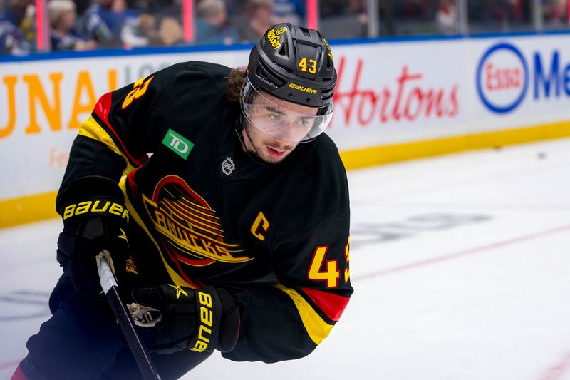 Nov 9, 2024; Vancouver, British Columbia, CAN; Vancouver Canucks defenseman Quinn Hughes (43) skates during warm up prior to a game against the Edmonton Oilers at Rogers Arena. Mandatory Credit: Bob Frid-Imagn Images