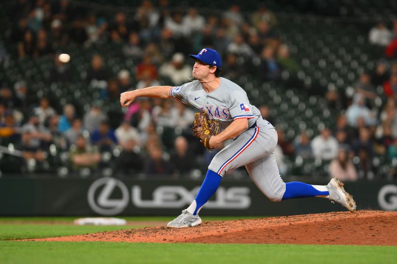 Sep 12, 2024; Seattle, Washington, USA; Texas Rangers relief pitcher Matt Festa (63) pitches to Seattle Mariners during the seventh inning at T-Mobile Park. Mandatory Credit: Steven Bisig-Imagn Images