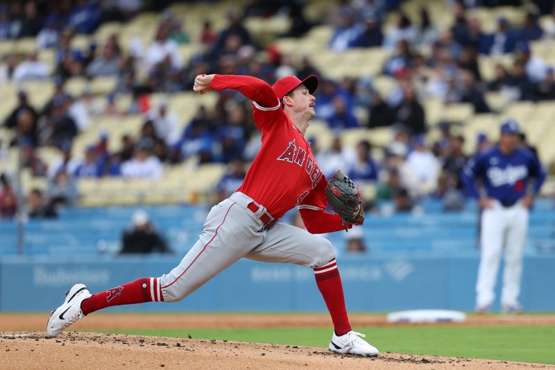 Mar 24, 2024; Los Angeles, California, USA;  Los Angeles Angels starting pitcher Griffin Canning (47) pitches during the first inning against the Los Angeles Dodgers at Dodger Stadium. Mandatory Credit: Kiyoshi Mio-USA TODAY Sports