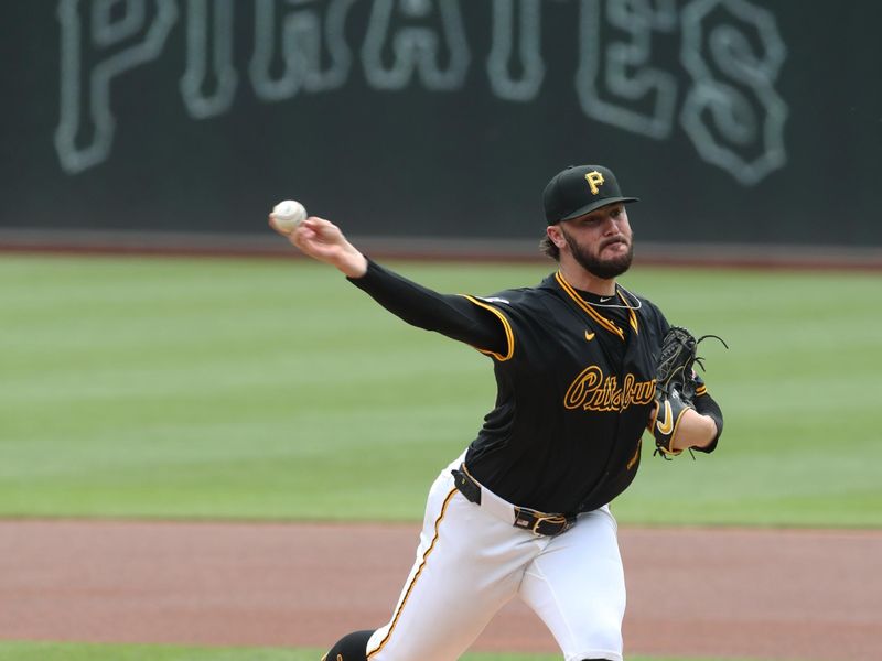 May 1, 2025; Pittsburgh, Pennsylvania, USA;  Pittsburgh Pirates starting pitcher Paul Skenes (30) delivers a pitch against the Chicago Cubs during the first inning at PNC Park. Mandatory Credit: Charles LeClaire-Imagn Imagesn