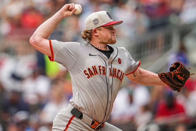 Jul 4, 2024; Cumberland, Georgia, USA; San Francisco Giants pitcher Logan Webb (62) pitches against the Atlanta Braves during the first inning at Truist Park. Mandatory Credit: Dale Zanine-USA TODAY Sports