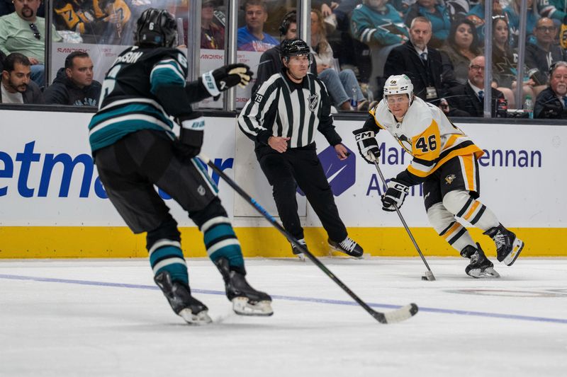 Oct 18, 2025; San Jose, California, USA; Pittsburgh Penguins center Blake Lizotte (46) skates with the puck against the San Jose Sharks during the second period at SAP Center at San Jose. Mandatory Credit: Neville E. Guard-Imagn Images