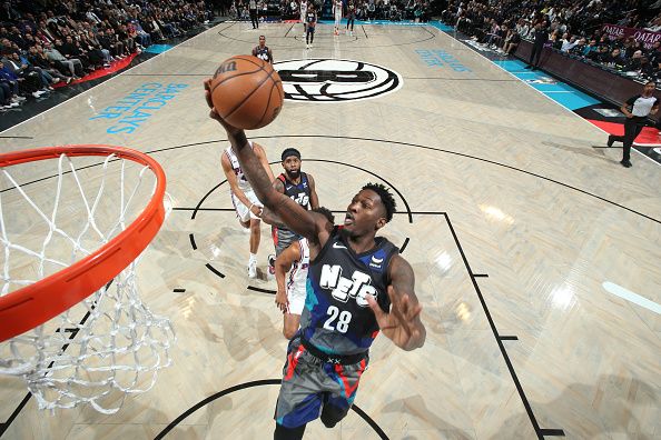 BROOKLYN, NY - NOVEMBER 19: Dorian Finney-Smith #28 of the Brooklyn Nets drives to the basket during the game against the Philadelphia 76ers on November 19, 2023 at Barclays Center in Brooklyn, New York. NOTE TO USER: User expressly acknowledges and agrees that, by downloading and or using this Photograph, user is consenting to the terms and conditions of the Getty Images License Agreement. Mandatory Copyright Notice: Copyright 2023 NBAE (Photo by Nathaniel S. Butler/NBAE via Getty Images)