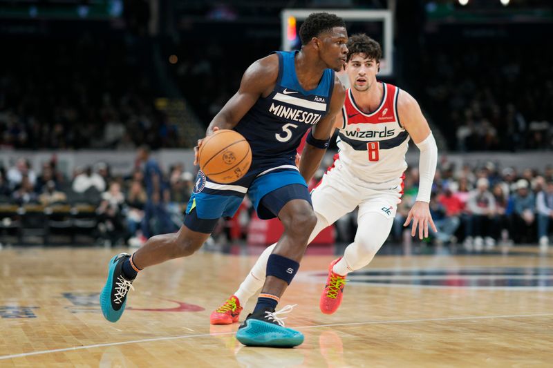 WASHINGTON, DC - JANUARY 24: Anthony Edwards #5 of the Minnesota Timberwolves dribbles to the hoop against Deni Avdija #8 of the Washington Wizards during the first half at Capital One Arena on January 24, 2024 in Washington, DC. NOTE TO USER: User expressly acknowledges and agrees that, by downloading and or using this photograph, User is consenting to the terms and conditions of the Getty Images License Agreement. (Photo by Jess Rapfogel/Getty Images)