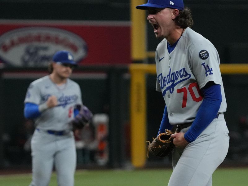 Sep 24, 2025; Phoenix, Arizona, USA; Los Angeles Dodgers pitcher Justin Wrobleski (70) reacts after defeating the Arizona Diamondbacks at Chase Field. Mandatory Credit: Rick Scuteri-Imagn Images