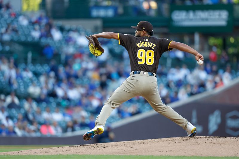 May 7, 2024; Chicago, Illinois, USA; San Diego Padres starting pitcher Randy Vasquez (98) delivers a pitch against the Chicago Cubs during the first inning at Wrigley Field. Mandatory Credit: Kamil Krzaczynski-USA TODAY Sports