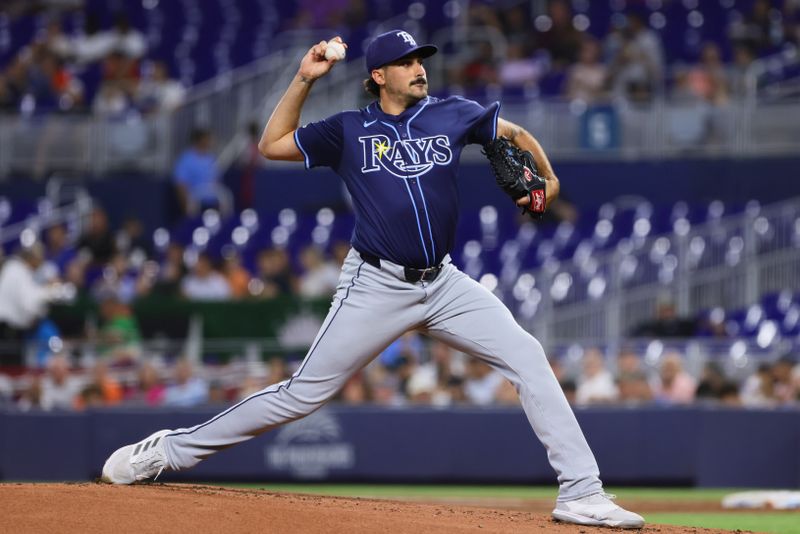 Jun 5, 2024; Miami, Florida, USA; Tampa Bay Rays starting pitcher Zach Eflin (24) delivers a pitch against the Miami Marlins during the first inning at loanDepot Park. Mandatory Credit: Sam Navarro-USA TODAY Sports