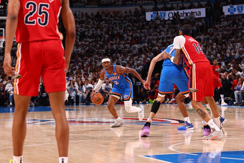 OKLAHOMA CITY, OK - APRIL 24: Shai Gilgeous-Alexander #2 of the Oklahoma City Thunder dribbles the ball during the game against the New Orleans Pelicans during Round 1 Game 2 of the 2024 NBA Playoffs on April 24, 2024 at Paycom Arena in Oklahoma City, Oklahoma. NOTE TO USER: User expressly acknowledges and agrees that, by downloading and or using this photograph, User is consenting to the terms and conditions of the Getty Images License Agreement. Mandatory Copyright Notice: Copyright 2024 NBAE (Photo by Zach Beeker/NBAE via Getty Images)