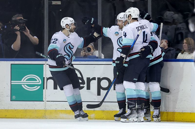 Jan 16, 2024; New York, New York, USA; Seattle Kraken right wing Jordan Eberle (7) celebrates his power play goal against the New York Rangers with teammates during the first period at Madison Square Garden. Mandatory Credit: Brad Penner-USA TODAY Sports