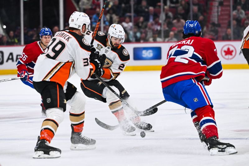 Feb 13, 2024; Montreal, Quebec, CAN; Anaheim Ducks center Bo Groulx (24) plays the puck against the Montreal Canadiens during the first period at Bell Centre. Mandatory Credit: David Kirouac-USA TODAY Sports