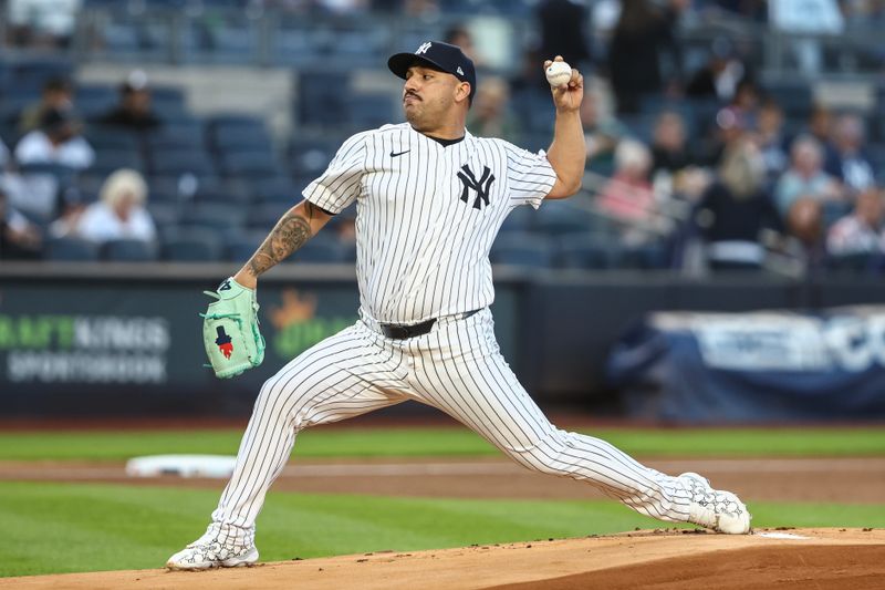 Aug 21, 2024; Bronx, New York, USA;  New York Yankees starting pitcher Nestor Cortes (65) pitches in the first inning against the Cleveland Guardians at Yankee Stadium. Mandatory Credit: Wendell Cruz-USA TODAY Sports