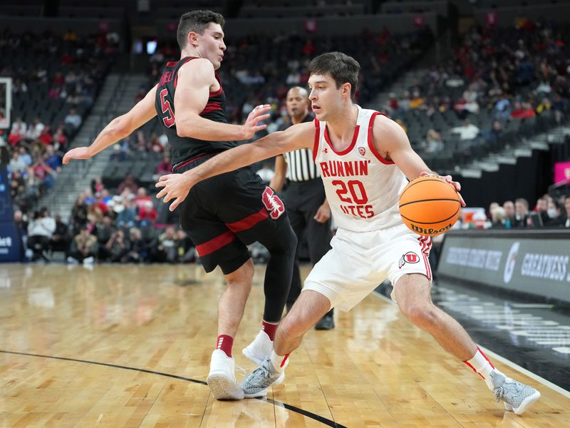 Mar 8, 2023; Las Vegas, NV, USA; Utah Utes guard Lazar Stefanovic (20) attempts to dribble around Stanford Cardinal guard Michael O'Connell (5) during the second half at T-Mobile Arena. Mandatory Credit: Stephen R. Sylvanie-USA TODAY Sports