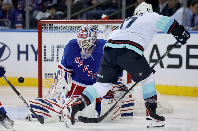 Jan 16, 2024; New York, New York, USA; New York Rangers goaltender Igor Shesterkin (31) makes a save against Seattle Kraken center Jaden Schwartz (17) during the second period at Madison Square Garden. Mandatory Credit: Brad Penner-USA TODAY Sports