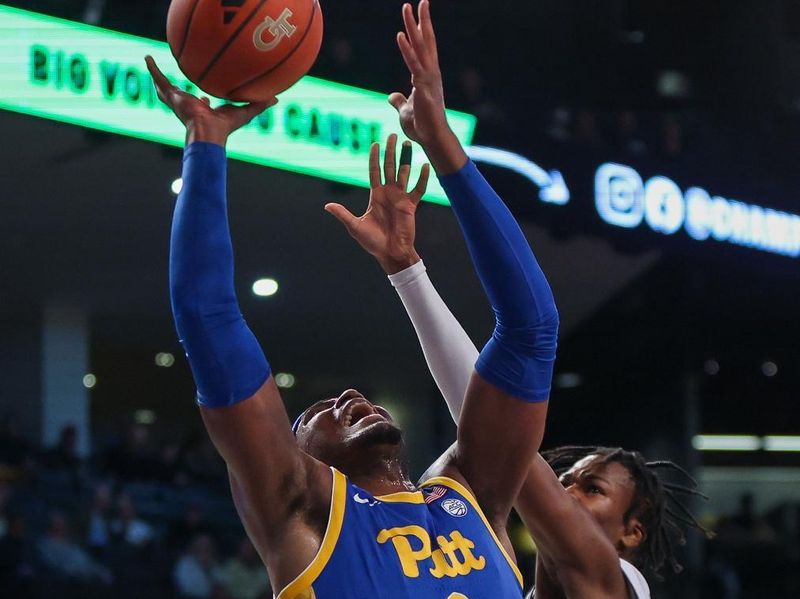 Jan 23, 2024; Atlanta, Georgia, USA; Pittsburgh Panthers forward Blake Hinson (2) shoots past Georgia Tech Yellow Jackets guard Miles Kelly (13) in the first half at McCamish Pavilion. Mandatory Credit: Brett Davis-USA TODAY Sports
