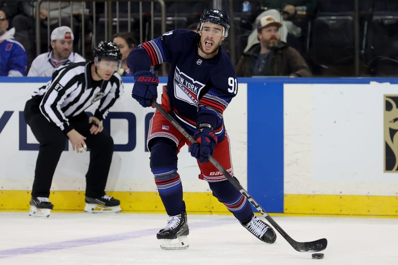 Dec 6, 2024; New York, New York, USA; New York Rangers right wing Reilly Smith (91) plays the puck against the Pittsburgh Penguins during the first period at Madison Square Garden. Mandatory Credit: Brad Penner-Imagn Images