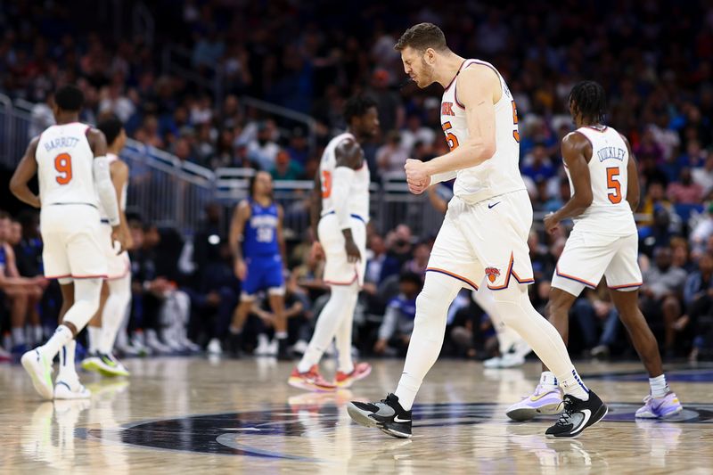 ORLANDO, FLORIDA - MARCH 23: Isaiah Hartenstein #55 of the New York Knicks reacts against the Orlando Magic during the third quarter at Amway Center on March 23, 2023 in Orlando, Florida. NOTE TO USER: User expressly acknowledges and agrees that, by downloading and or using this photograph, User is consenting to the terms and conditions of the Getty Images License Agreement. (Photo by Douglas P. DeFelice/Getty Images)