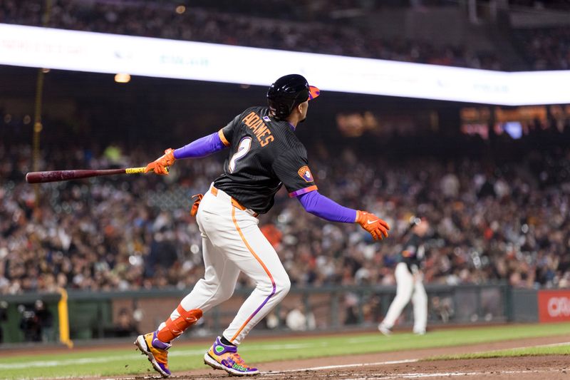May 13, 2025; San Francisco, California, USA; San Francisco Giants shortstop Willy Adames (2) hits a two-run home run against the Arizona Diamondbacks during the fifth inning at Oracle Park. Mandatory Credit: John Hefti-Imagn Images