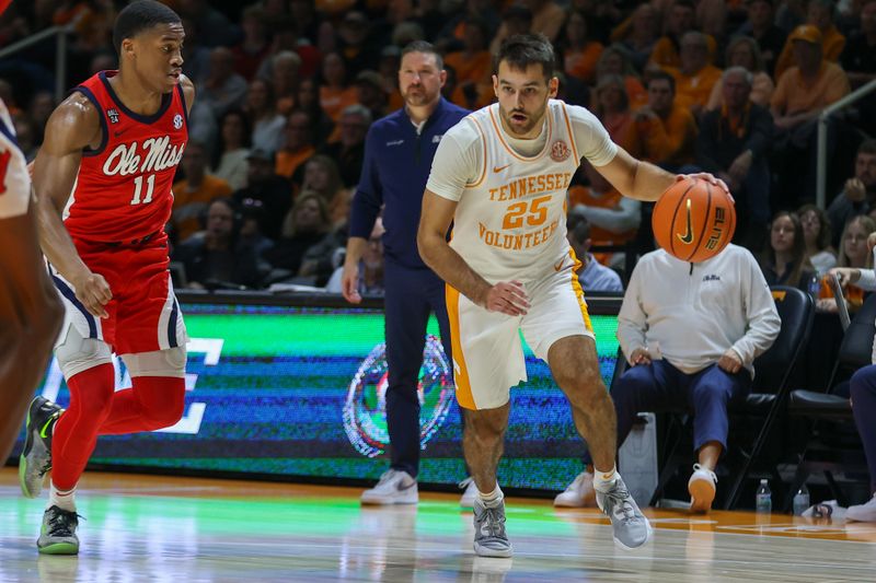 Jan 6, 2024; Knoxville, Tennessee, USA; Tennessee Volunteers guard Santiago Vescovi (25) moves the ball against the Mississippi Rebels during the first half at Thompson-Boling Arena at Food City Center. Mandatory Credit: Randy Sartin-USA TODAY Sports