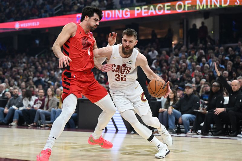 CLEVELAND, OH - MARCH 2: Dean Wade #32 of the Cleveland Cavaliers drives to the basket during the game against the Portland Trail Blazers on March 2, 2025 at Rocket Arena in Cleveland, Ohio. NOTE TO USER: User expressly acknowledges and agrees that, by downloading and/or using this Photograph, user is consenting to the terms and conditions of the Getty Images License Agreement. Mandatory Copyright Notice: Copyright 2025 NBAE (Photo by Brian Kolin/NBAE via Getty Images)