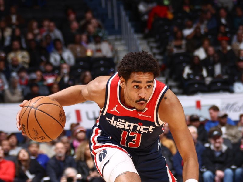 WASHINGTON, DC -? MARCH 23:  Jordan Poole #13 of the Washington Wizards goes to the basket during the game on March 23, 2024 at Capital One Arena in Washington, DC. NOTE TO USER: User expressly acknowledges and agrees that, by downloading and or using this Photograph, user is consenting to the terms and conditions of the Getty Images License Agreement. Mandatory Copyright Notice: Copyright 2024 NBAE (Photo by Kenny Giarla/NBAE via Getty Images)