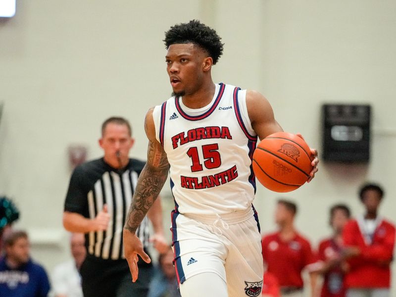 Feb 9, 2023; Boca Raton, Florida, USA; Florida Atlantic Owls guard Alijah Martin (15) dribbles the ball down the court against the Rice Owls during the first half at Eleanor R. Baldwin Arena. Mandatory Credit: Rich Storry-USA TODAY Sports