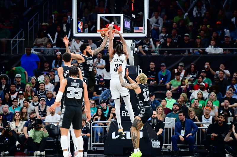 AUSTIN, TX - MARCH 17: Nicolas Claxton #33 of the Brooklyn Nets dunks the ball during the game against the San Antonio Spurs on March 17, 2024 at the Moody Center in Austin, Texas. NOTE TO USER: User expressly acknowledges and agrees that, by downloading and or using this photograph, user is consenting to the terms and conditions of the Getty Images License Agreement. Mandatory Copyright Notice: Copyright 2024 NBAE (Photos by Michael Gonzales/NBAE via Getty Images)