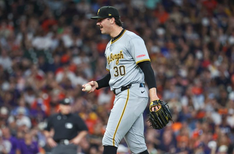 Jul 29, 2024; Houston, Texas, USA; Pittsburgh Pirates starting pitcher Paul Skenes (30) smiles during the third inning against the Houston Astros at Minute Maid Park. Mandatory Credit: Troy Taormina-USA TODAY Sports