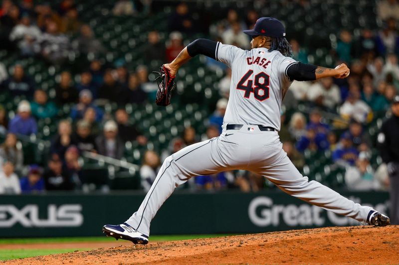 Apr 2, 2024; Seattle, Washington, USA; Cleveland Guardians relief pitcher Emmanuel Clase (48) throws against the Seattle Mariners during the ninth inning at T-Mobile Park. Mandatory Credit: Joe Nicholson-USA TODAY Sports