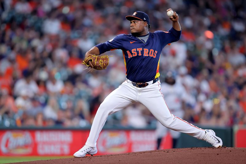 Jun 1, 2024; Houston, Texas, USA; Houston Astros starting pitcher Framber Valdez (59) delivers against the Minnesota Twins during the first inning at Minute Maid Park. Mandatory Credit: Erik Williams-USA TODAY Sports