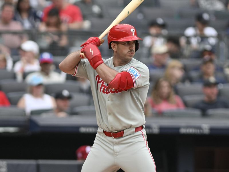 Jul 27, 2025; Bronx, New York, USA; Philadelphia Phillies first baseman Otto Kemp (4) at bat during a game against the New York Yankees at Yankee Stadium. Mandatory Credit: John Jones-Imagn Images