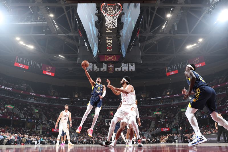 Cleveland, OH - OCTOBER 10: Tyrese Haliburton #0 of the Indiana Pacers shoots the ball during the game against the Cleveland Cavaliers during a NBA pre season game on October 10, 2024 at Rocket Mortgage Fieldhouse in Cleveland, Ohio. NOTE TO USER: User expressly acknowledges and agrees that, by downloading and or using this photograph, User is consenting to the terms and conditions of the Getty Images License Agreement. Mandatory Copyright Notice: Copyright 2024 NBAE (Photo by Jeff Haynes/NBAE via Getty Images)