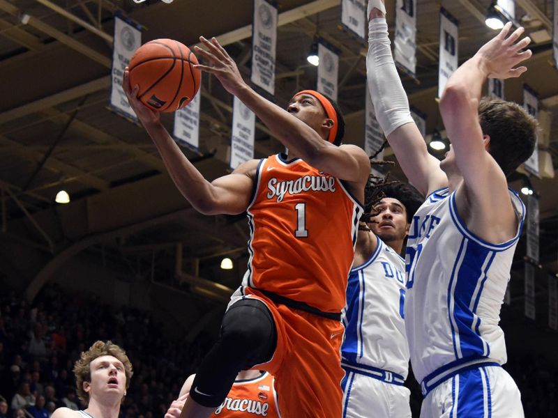 Jan 2, 2024; Durham, North Carolina, USA;  Syracuse Orange forward Maliq Brown (1) lays the ball up in front of Duke Blue Devils center Kyle Filipowski (30) during the first half at Cameron Indoor Stadium. Mandatory Credit: Rob Kinnan-USA TODAY Sports