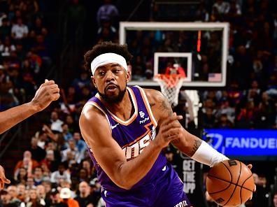 PHOENIX, AZ - DECEMBER 12: Jordan Goodwin #0 of the Phoenix Suns dribbles the ball during the game against the Golden State Warriors on December 12, 2023 at Footprint Center in Phoenix, Arizona. NOTE TO USER: User expressly acknowledges and agrees that, by downloading and or using this photograph, user is consenting to the terms and conditions of the Getty Images License Agreement. Mandatory Copyright Notice: Copyright 2023 NBAE (Photo by Barry Gossage/NBAE via Getty Images)