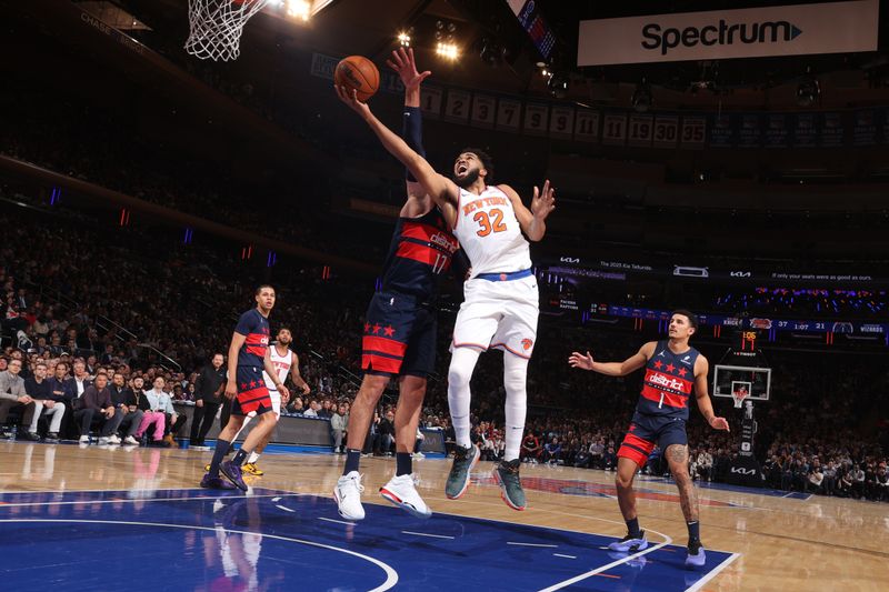 NEW YORK, NY - NOVEMBER 18: Karl-Anthony Towns #32 of the New York Knicks drives to the basket during the game against the Washington Wizards on November 18, 2024 at Madison Square Garden in New York City, New York.  NOTE TO USER: User expressly acknowledges and agrees that, by downloading and or using this photograph, User is consenting to the terms and conditions of the Getty Images License Agreement. Mandatory Copyright Notice: Copyright 2024 NBAE  (Photo by Nathaniel S. Butler/NBAE via Getty Images)