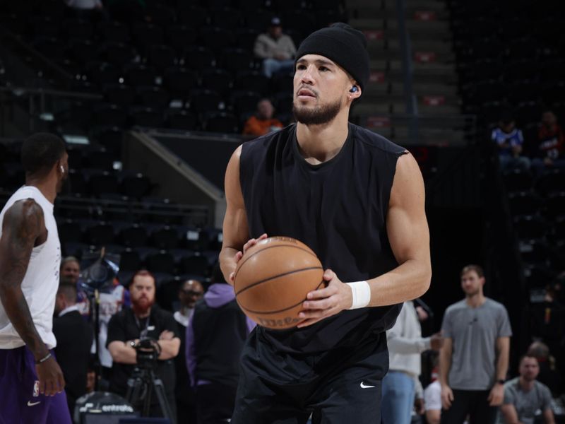 SALT LAKE CITY, UT - DECEMBER 13: Devin Booker #1 of the Phoenix Suns warms up before the game against the Utah Jazz  during a regular season game on December 13, 2024 at Delta Center in Salt Lake City, Utah. NOTE TO USER: User expressly acknowledges and agrees that, by downloading and or using this Photograph, User is consenting to the terms and conditions of the Getty Images License Agreement. Mandatory Copyright Notice: Copyright 2024 NBAE (Photo by Melissa Majchrzak/NBAE via Getty Images)